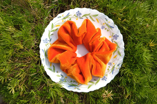 Orange velvet scrunchie
