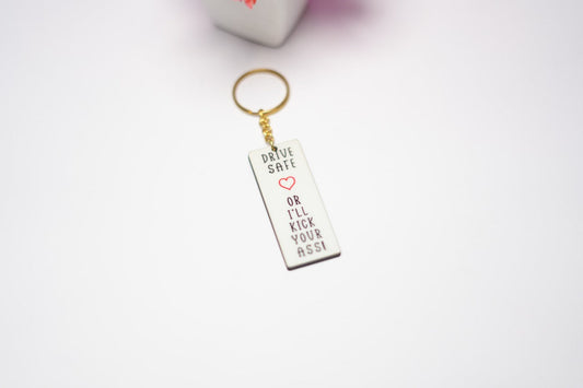 Drive safe Or I'll Kick your ass Keychain